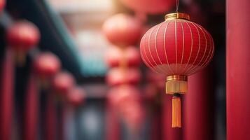 Vibrant red Chinese lanterns hang gracefully, illuminating the traditional architecture in a serene, festive atmosphere. photo