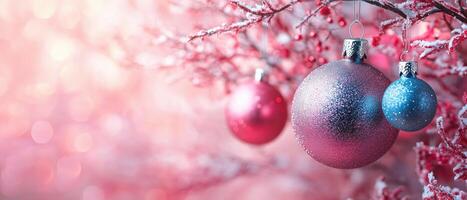 Colorful Christmas ornaments hanging on a frosted branch, creating a festive atmosphere with a soft, dreamy background. photo