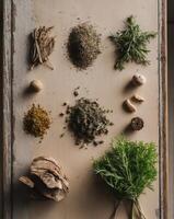 Herbs and spices on a wooden table photo