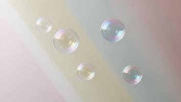Soap bubbles floating in a rainbow colored background photo