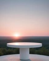 Table with sunset on top of a hill photo