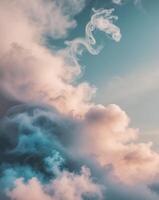 Clouds and smoke in the sky with a blue sky photo