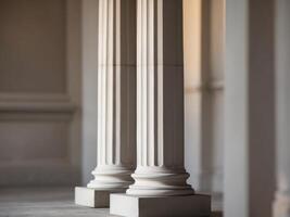 Three columns in a room with white walls photo