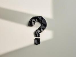 Question mark on white background with shadow photo