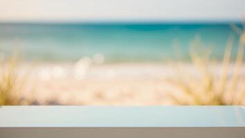 An empty table with a view of the beach photo