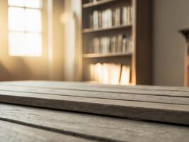 An empty wooden table in front of a bookcase photo
