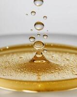 A close up of a liquid being poured into a bowl photo