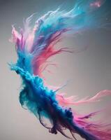 A colorful liquid is being sprayed into the air photo