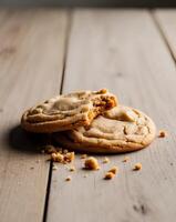 A peanut butter cookie with a bite taken out of it photo