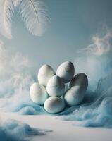 A group of white eggs with feathers on a blue background photo