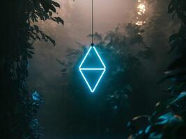 A neon triangle hanging from a tree in the dark photo
