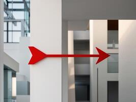 A red arrow pointing to the right in a building photo