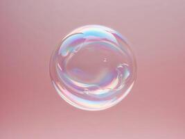 A bubble of soap floating in the air on a pink background photo