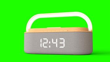 wireless alarm clock with green background photo