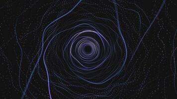 A dark tunnel with a blue light in the center video