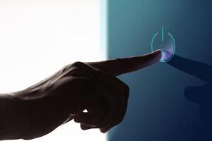 Start Concepts. Startup, Beginning, Start a New Business. Hand Touchning a Button to Start to do something. Futuristic tone photo
