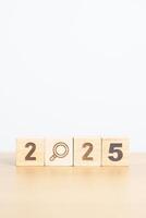 2025 block with magnifying glass icon. SEO, Search Engine Optimization, hiring , Advertising, Idea, Strategy, marketing, Keyword, Content and New Year start concepts photo