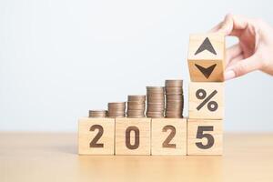 2024 to 2025 New year with percentage change to UP and Down arrow with coin stack. Interest rate, GDP, stocks market, financial, deflation and Inflation, mortgage, debt, Loan and Economic Recession photo