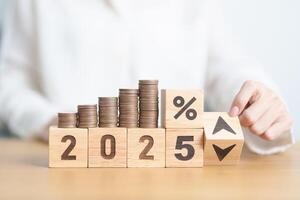 2024 to 2025 New year with percentage change to UP and Down arrow with coin stack. Interest rate, GDP, stocks market, financial, deflation and Inflation, mortgage, debt, Loan and Economic Recession photo