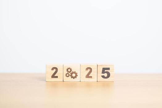 2024 year change to 2025 year block with gear icon. Business Process, Team, teamwork, Goal, Target, Resolution, strategy, plan, Action, motivation, change, brainstorm and New Year start concepts photo
