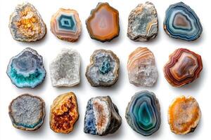 Colorful polished agate slices and geodes showing intricate patterns on white background photo