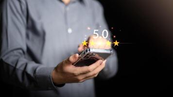 Male consumers rate their satisfaction and rate and review them online. Customer Experience Survey Concepts for Services and Products and Customer Engagement photo