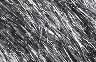 Shiny metallic strips creating reflective background texture. photo