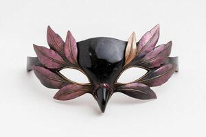 Ornate feathered masquerade mask photo