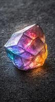 Colorful crystal gemstone on dark background photo