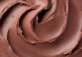 Smooth chocolate frosting texture photo