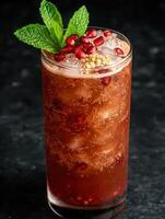 refreshing pomegranate cocktail with mint garnish photo