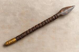 Handcrafted primitive spear with wrapped handle photo