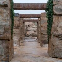 Rustic stone archway with ivy photo
