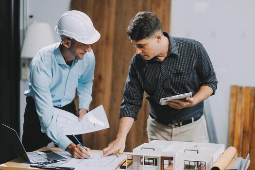 Team Engineers with draft plan of building on constructing site. Engineer work on site. engineer visit and inspection site engineer. Inspector engineer check and working on site. photo