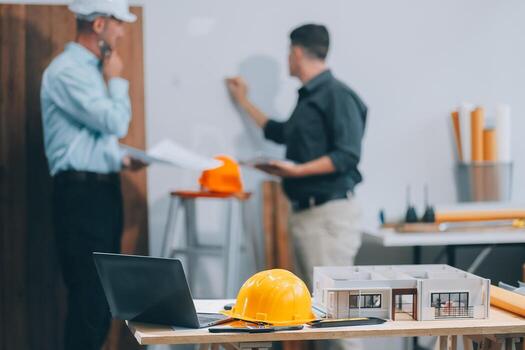 Team Engineers with draft plan of building on constructing site. Engineer work on site. engineer visit and inspection site engineer. Inspector engineer check and working on site. photo