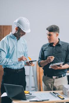 Team Engineers with draft plan of building on constructing site. Engineer work on site. engineer visit and inspection site engineer. Inspector engineer check and working on site. photo