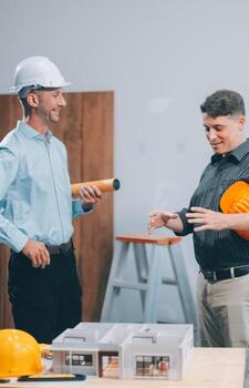 Team Engineers with draft plan of building on constructing site. Engineer work on site. engineer visit and inspection site engineer. Inspector engineer check and working on site. photo