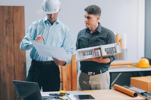 Team Engineers with draft plan of building on constructing site. Engineer work on site. engineer visit and inspection site engineer. Inspector engineer check and working on site. photo