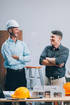 Team Engineers with draft plan of building on constructing site. Engineer work on site. engineer visit and inspection site engineer. Inspector engineer check and working on site. photo