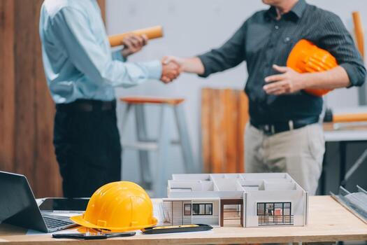 Team Engineers with draft plan of building on constructing site. Engineer work on site. engineer visit and inspection site engineer. Inspector engineer check and working on site. photo