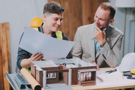 Team Engineers with draft plan of building on constructing site. Engineer work on site. engineer visit and inspection site engineer. Inspector engineer check and working on site. photo