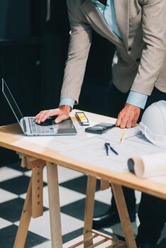 Team Engineers with draft plan of building on constructing site. Engineer work on site. engineer visit and inspection site engineer. Inspector engineer check and working on site. photo