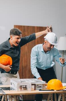 Team Engineers with draft plan of building on constructing site. Engineer work on site. engineer visit and inspection site engineer. Inspector engineer check and working on site. photo