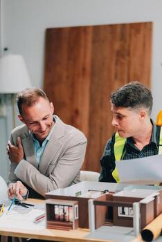 Team Engineers with draft plan of building on constructing site. Engineer work on site. engineer visit and inspection site engineer. Inspector engineer check and working on site. photo