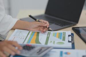 Business Documents, Auditor businesswoman checking searching document legal prepare paperwork or report for analysis TAX time,accountant Documents data contract partner deal in workplace office photo