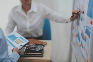 Business Documents, Auditor businesswoman checking searching document legal prepare paperwork or report for analysis TAX time,accountant Documents data contract partner deal in workplace office photo