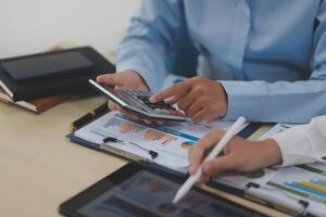 Business Documents, Auditor businesswoman checking searching document legal prepare paperwork or report for analysis TAX time,accountant Documents data contract partner deal in workplace office photo