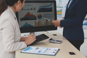 Business Documents, Auditor businesswoman checking searching document legal prepare paperwork or report for analysis TAX time,accountant Documents data contract partner deal in workplace office photo