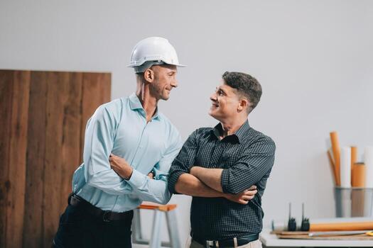 Team Engineers with draft plan of building on constructing site. Engineer work on site. engineer visit and inspection site engineer. Inspector engineer check and working on site. photo