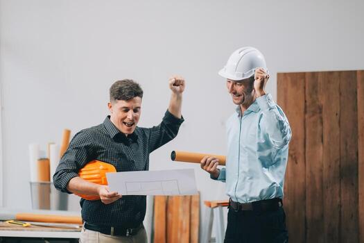 Team Engineers with draft plan of building on constructing site. Engineer work on site. engineer visit and inspection site engineer. Inspector engineer check and working on site. photo